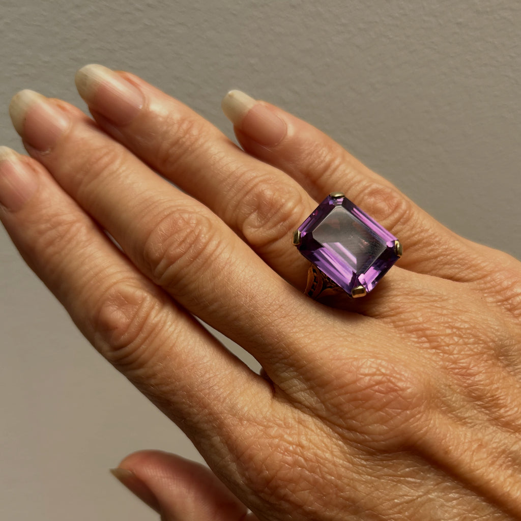 Square cut Amethyst set in 9Kt gold Ring