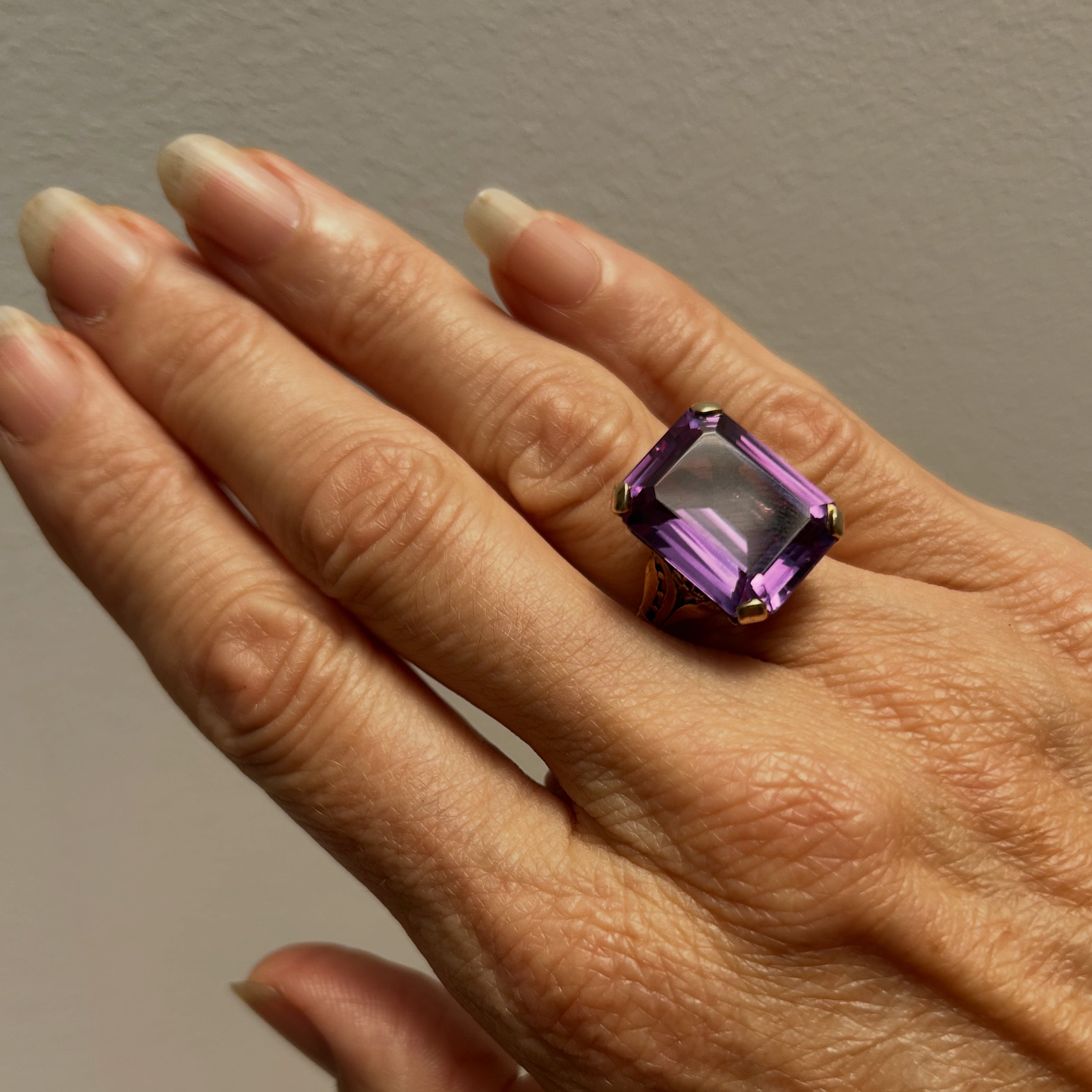 Square cut Amethyst set in 9Kt gold Ring