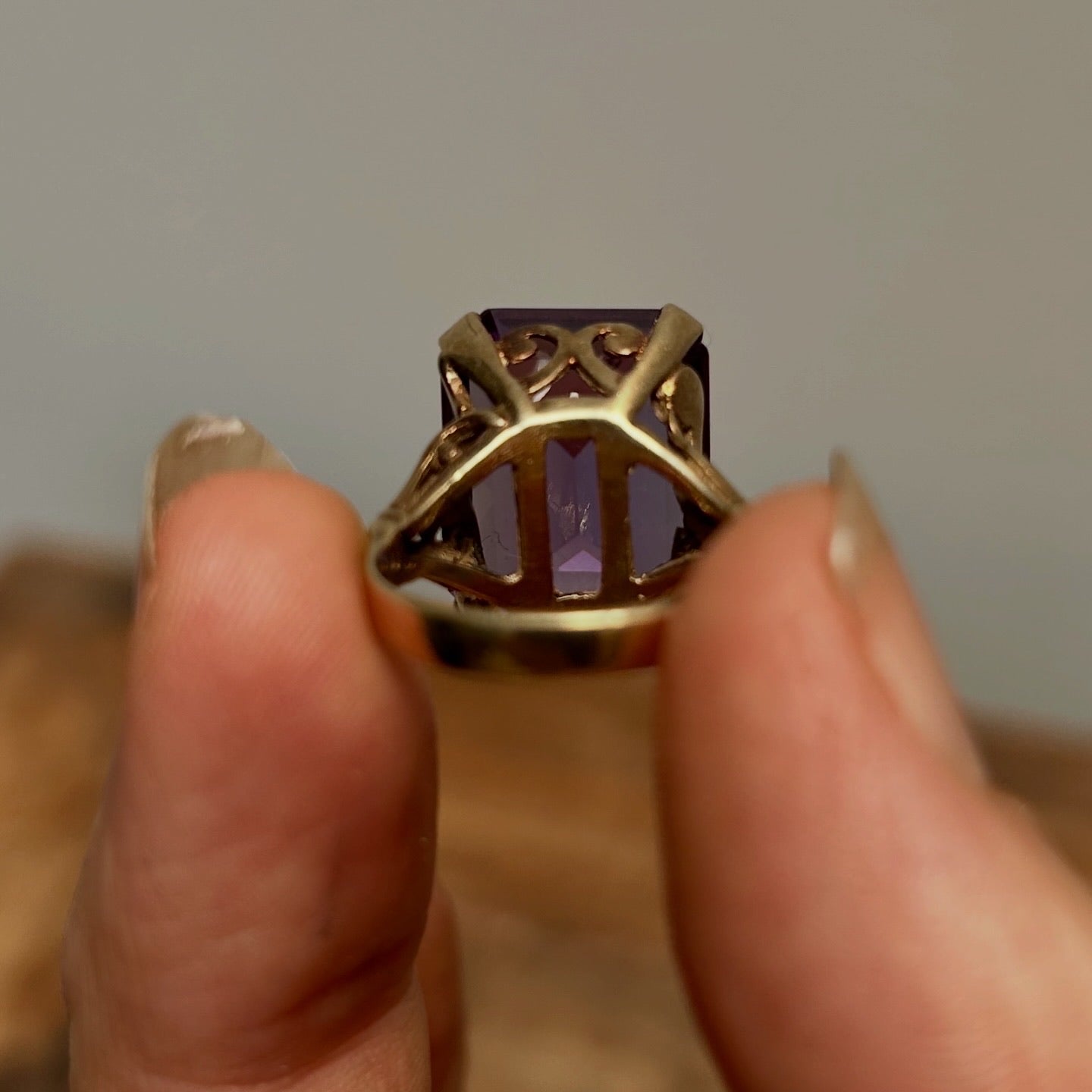 Square cut Amethyst set in 9Kt gold Ring