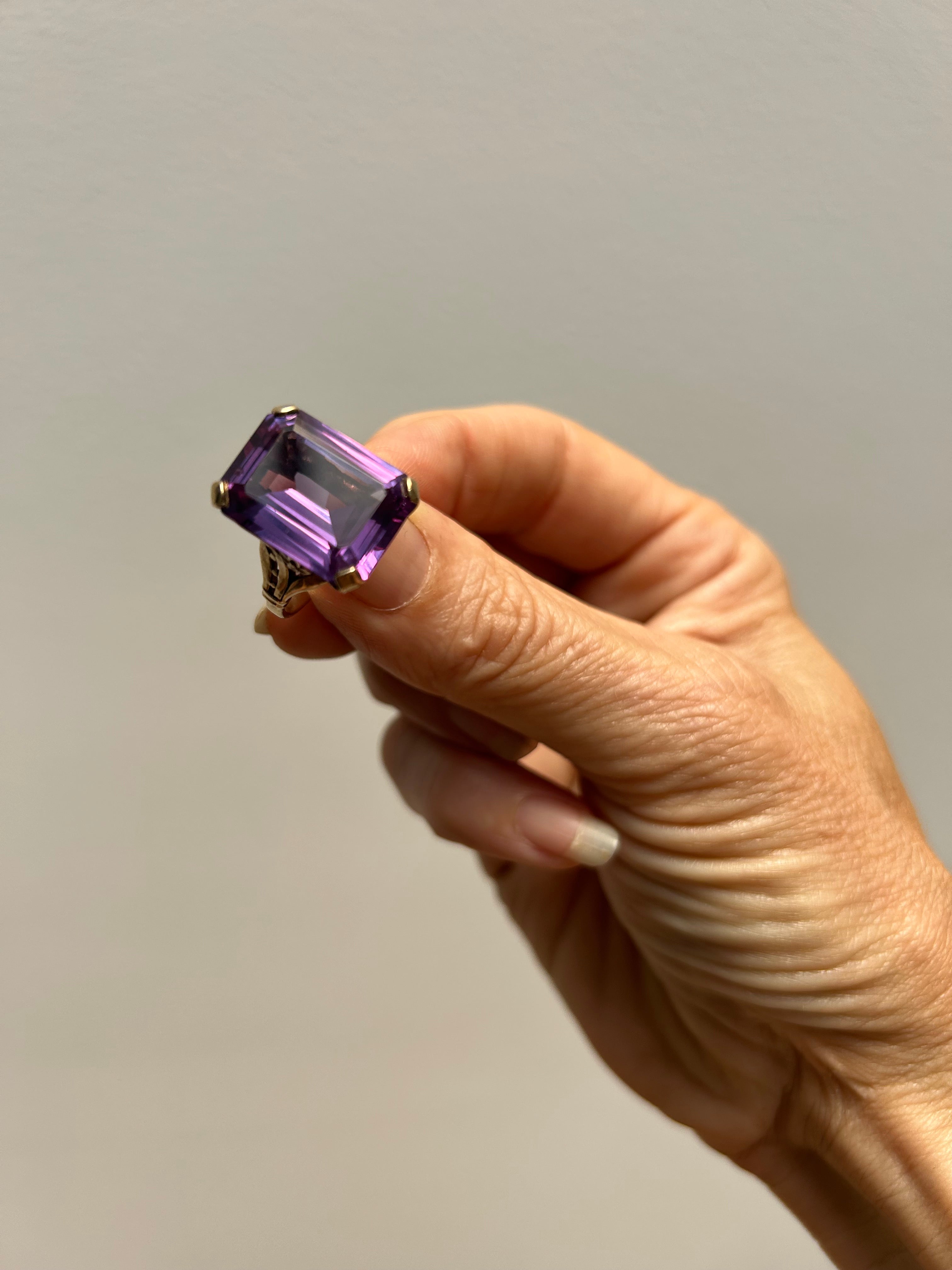 Square cut Amethyst set in 9Kt gold Ring