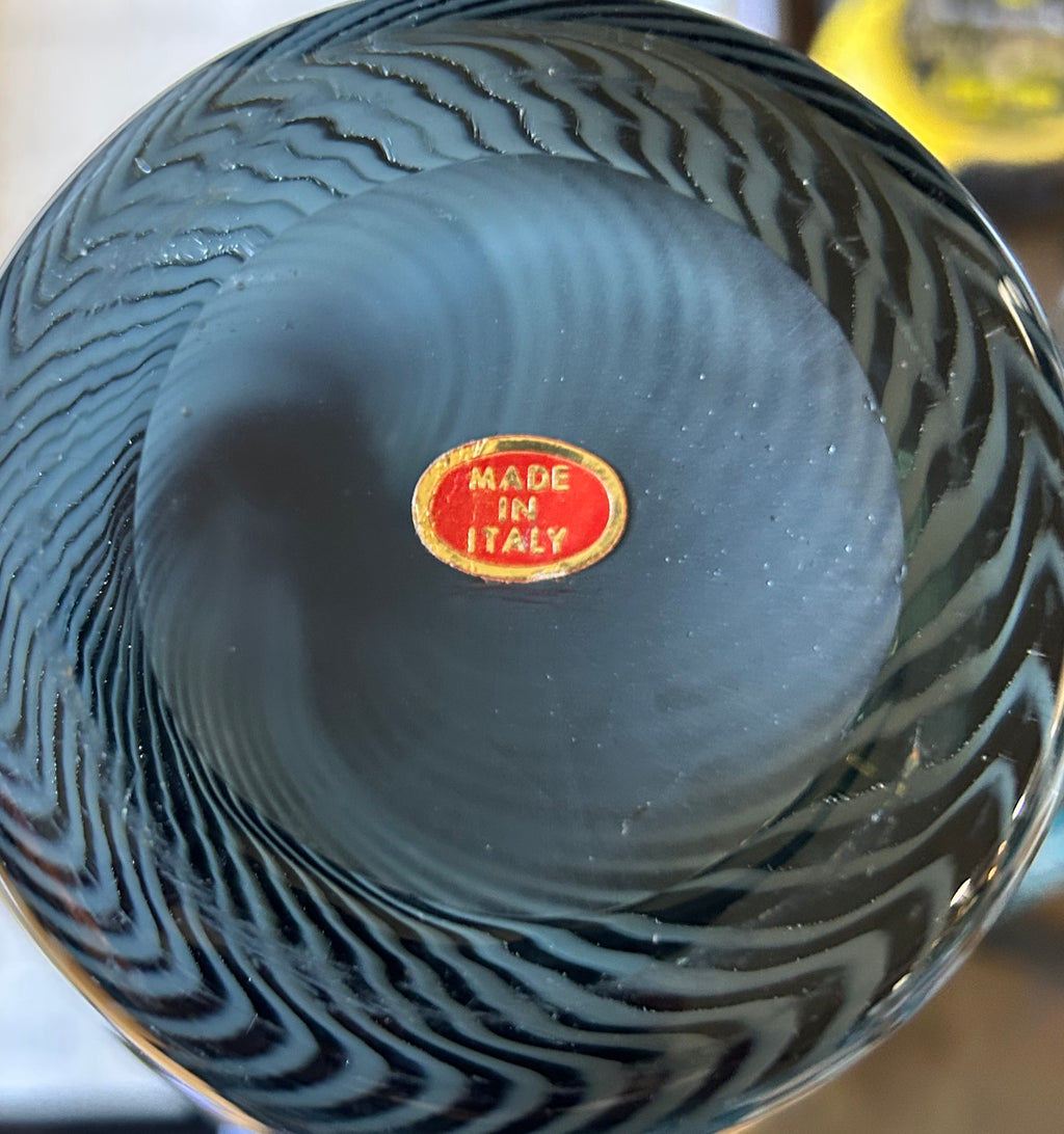 Glass vase base with 'Made in Italy' label on a white background